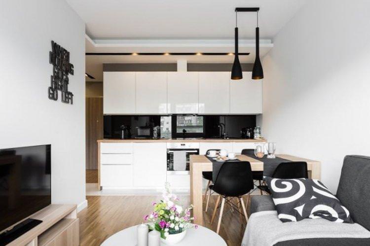 Біла кухня-вітальня - дизайн інтер'єру фото