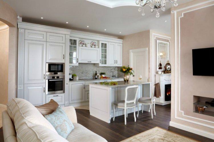 Біла кухня-вітальня - дизайн інтер'єру фото
