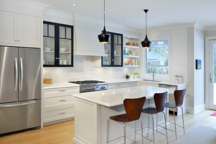 Чорно-біла кухня з білою стільницею - дизайн фото