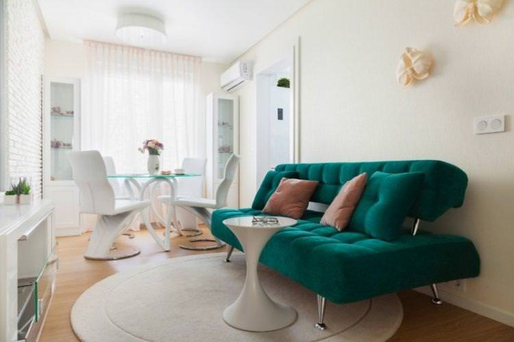 Зелений колір в інтер'єрі вітальні - дизайн фото