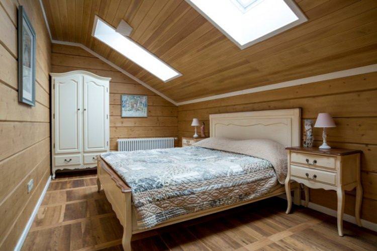 Дизайн спальні в мансарді - фото