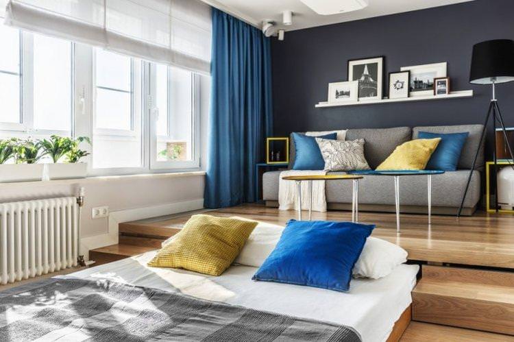 Висувне ліжко в подіумі - Дизайн однокімнатної квартири
